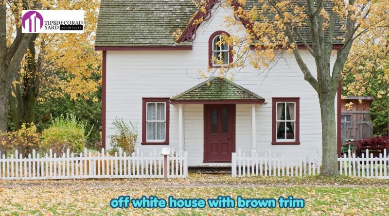 off white house with brown trim